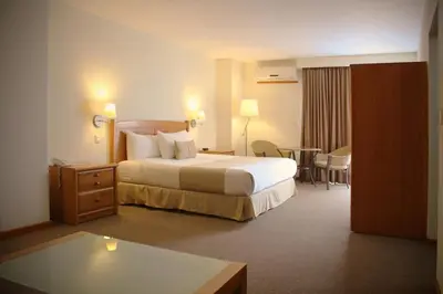 Cama o camas de una habitación en Gamma Durango Plaza Vizcaya
