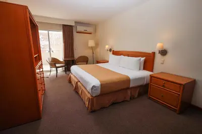 Cama o camas de una habitación en Gamma Durango Plaza Vizcaya