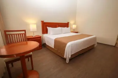 Cama o camas de una habitación en Gamma Durango Plaza Vizcaya