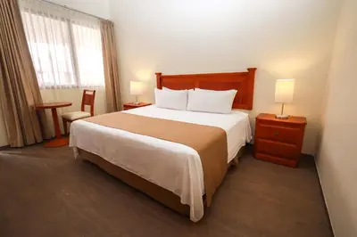 Cama o camas de una habitación en Gamma Durango Plaza Vizcaya