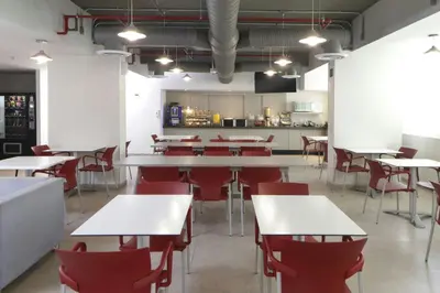 Un restaurante o sitio para comer en City Express Junior by Marriott Juarez Consulado