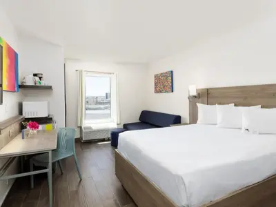 Cama o camas de una habitación en Hotel Mesaluna Near American Consulate