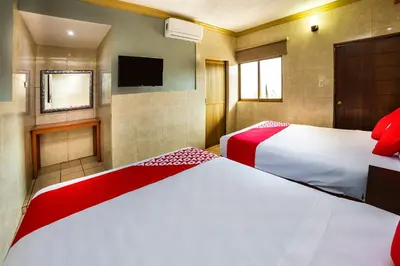 Cama o camas de una habitación en Hotel Romo