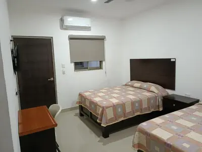 Cama o camas de una habitación en Hotel Romo