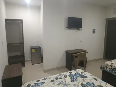 Cama o camas de una habitación en Hotel Romo