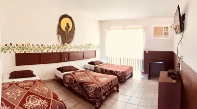 Cama o camas de una habitación en Hotel y R.V. Park El Moro