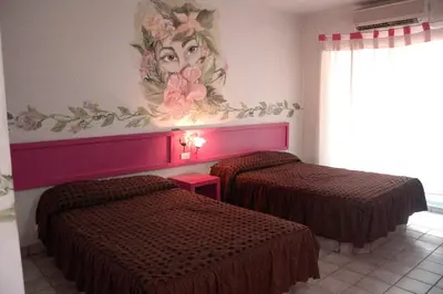 Cama o camas de una habitación en Hotel y R.V. Park El Moro