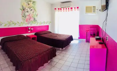 Cama o camas de una habitación en Hotel y R.V. Park El Moro