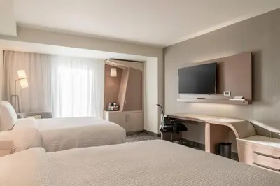 Cama o camas de una habitación en Courtyard by Marriott Ciudad Juarez