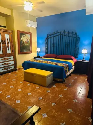 Cama o camas de una habitación en Casa de Leyendas