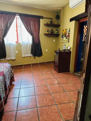 Cama o camas de una habitación en Casa de Leyendas