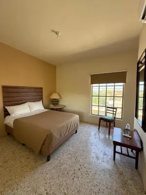 Cama o camas de una habitación en Hotel El Dorado