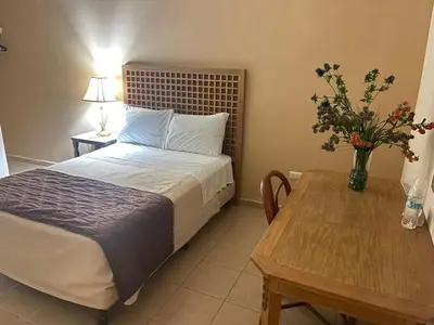 Cama o camas de una habitación en Hotel El Dorado