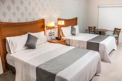 Cama o camas de una habitación en Hotel Maioris Navolato