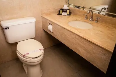 Un baño de Business Hotel & Suites María Bonita