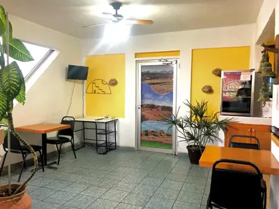 Una televisión o centro de entretenimiento en Hotel Paquime