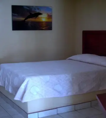 Cama o camas de una habitación en Hotel Duve Coral