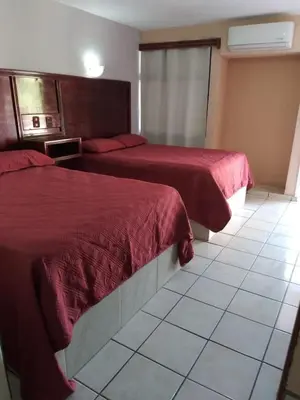 Cama o camas de una habitación en Hotel Duve Coral