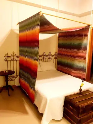Cama o camas de una habitación en Doroteo Hotel Boutique
