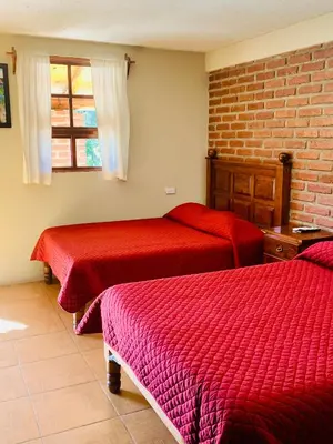 Cama o camas de una habitación en Cabañas las Gemelas