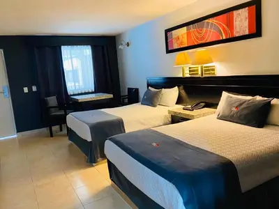 Cama o camas de una habitación en Hotel La Finca