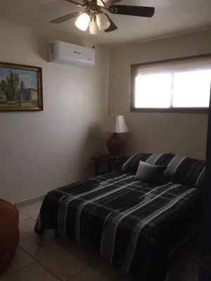 Cama o camas de una habitación en Apartment Downtown Cananea