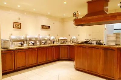 Una cocina o zona de cocina en Hotel Villa del Sol