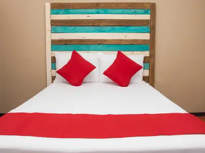 Cama o camas de una habitación en Hotel Allende 104