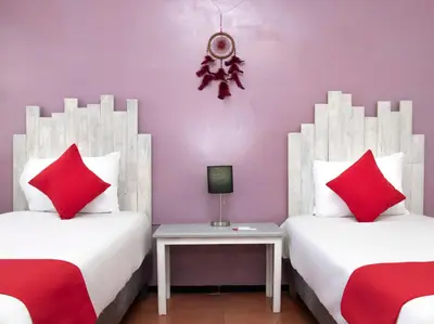 Cama o camas de una habitación en Hotel Allende 104