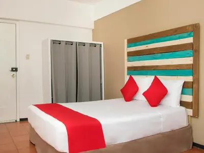 Cama o camas de una habitación en Hotel Allende 104