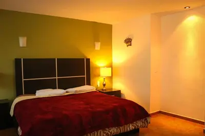 Cama o camas de una habitación en Vista Potrero - Hotel, Camping & Events