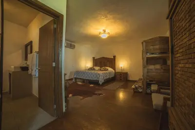 Cama o camas de una habitación en Hotel Posada las Nubes