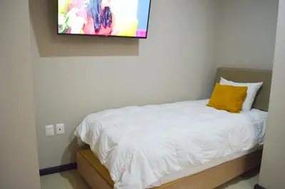 Cama o camas de una habitación en Bahia Marina Departamentos