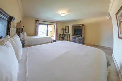 Cama o camas de una habitación en La Mision Loreto