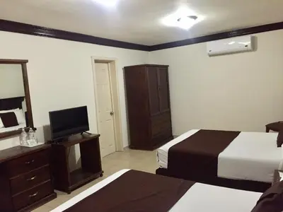 Cama o camas de una habitación en Hotel Go Inn