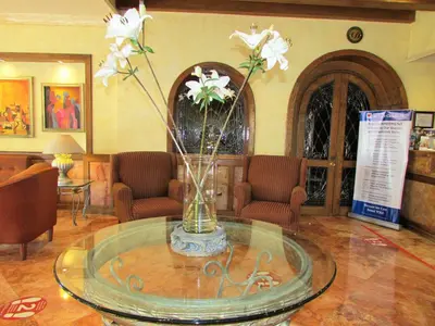 Zona de estar de Best Western Hotel Posada Del Rio Express