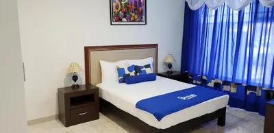 Cama o camas de una habitación en La Estancia Apartments Mazatlan