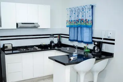 Una cocina o zona de cocina en La Estancia Apartments Mazatlan