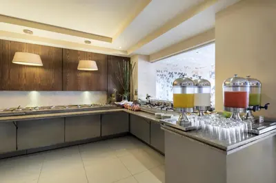 Una cocina o zona de cocina en Wyndham Garden Obregon