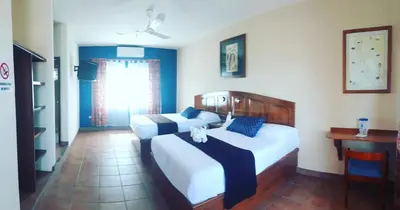 Cama o camas de una habitación en Hotel Angra
