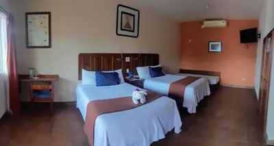 Cama o camas de una habitación en Hotel Angra