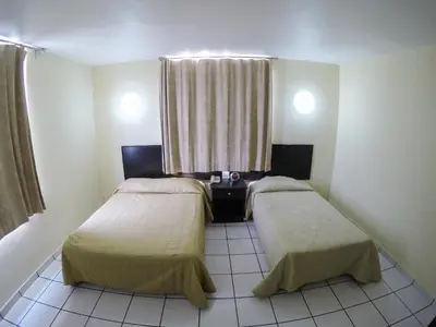 Cama o camas de una habitación en Hotel Davimar