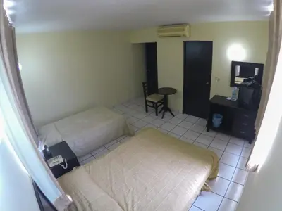 Cama o camas de una habitación en Hotel Davimar