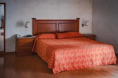Cama o camas de una habitación en Hostal de La Monja