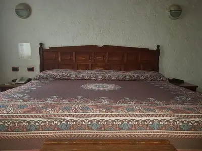 Cama o camas de una habitación en State Inn