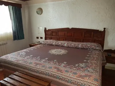 Cama o camas de una habitación en State Inn