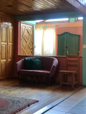 Zona de estar de Departamento tipo cabaña en Creel