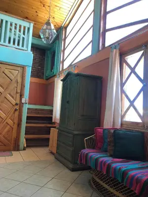 Zona de estar de Departamento tipo cabaña en Creel