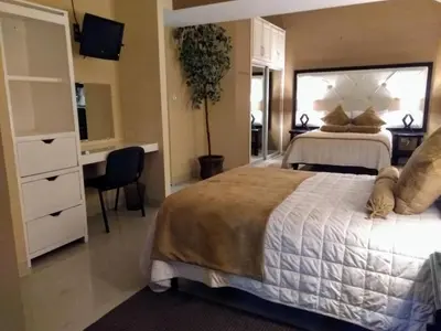 Cama o camas de una habitación en Hermoso Depto por UACH II Con Terraza y linda vista