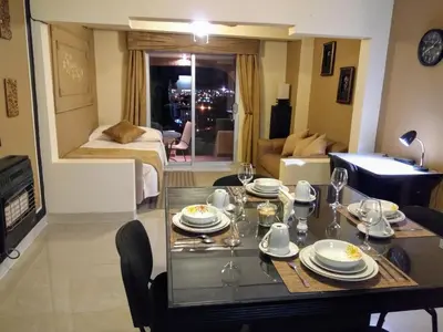 Cama o camas de una habitación en Hermoso Depto por UACH II Con Terraza y linda vista